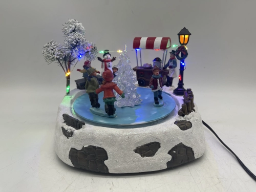 Figurină interactivă „Patinoar”